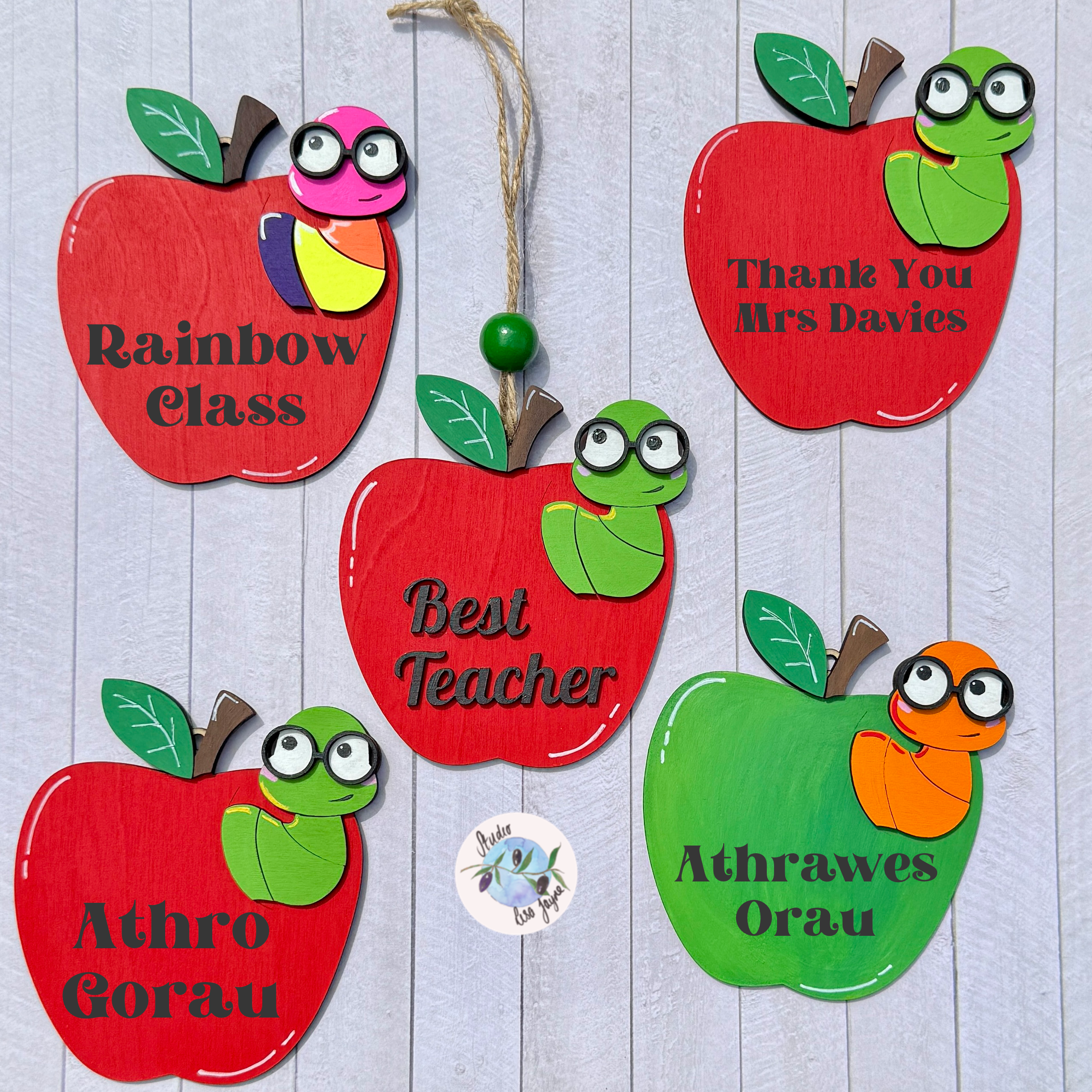 Best Teacher Apple End of Term Handmade Hanging Gift.  Layered plywood hand painted in red and green Thank You Teacher apple design
Welsh options available Athro Gorau, Athrawes Orau, Welsh Diolch