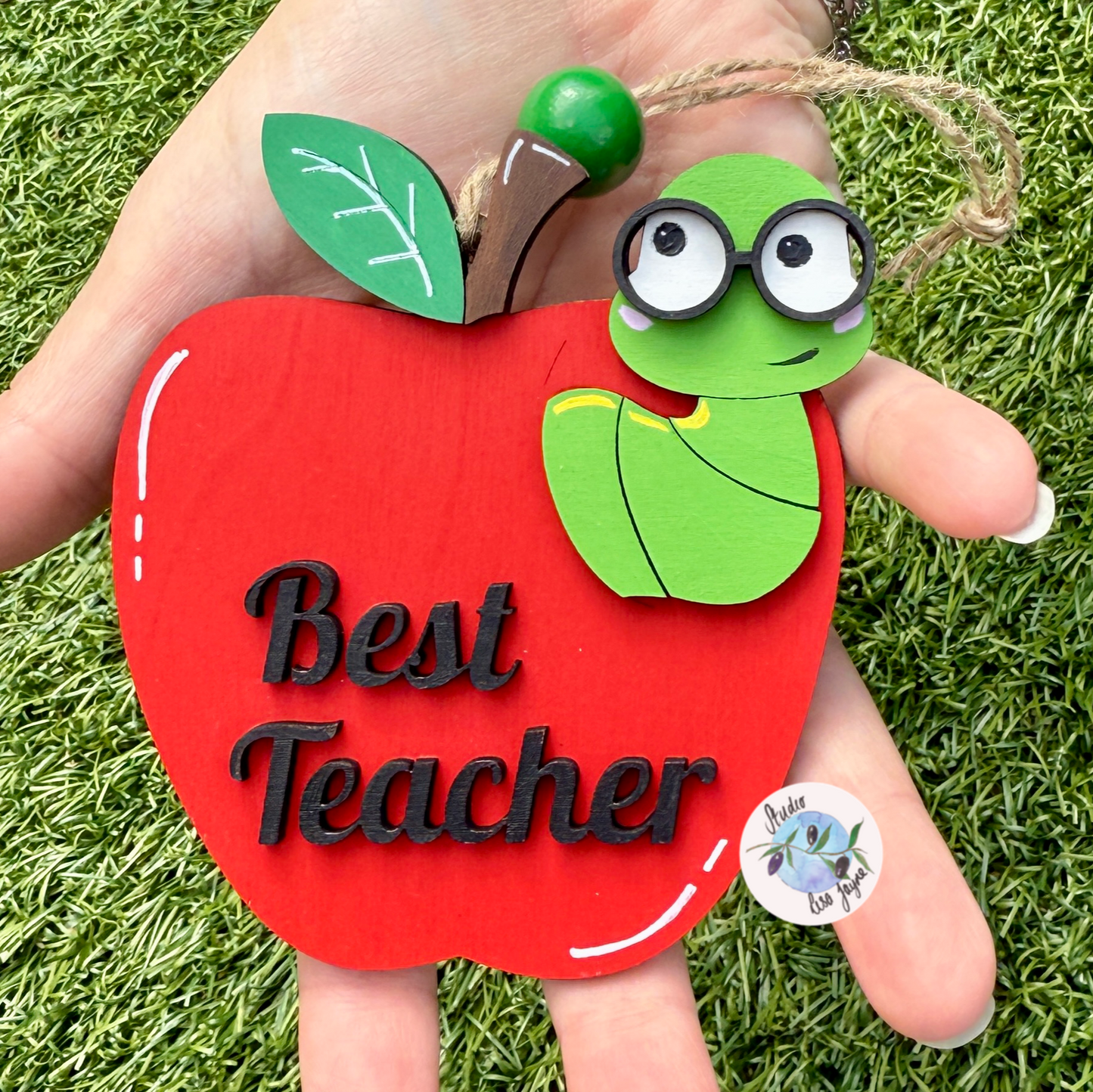 Best Teacher Apple End of Term Handmade Hanging Gift. Layered plywood hand painted in red and green Thank You Teacher apple design
Natural Grass background
