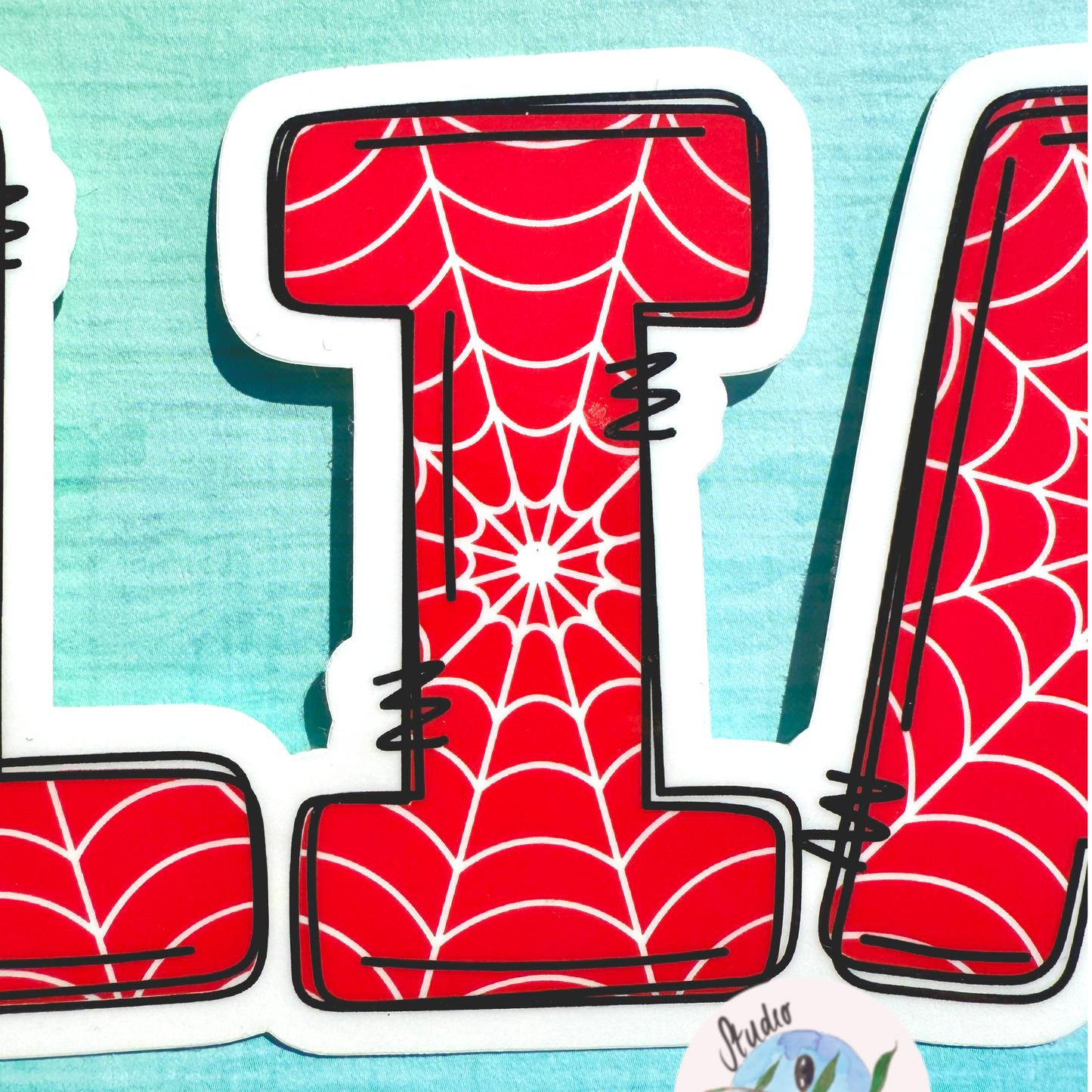 Red Spiderman Name Sticker Closeup