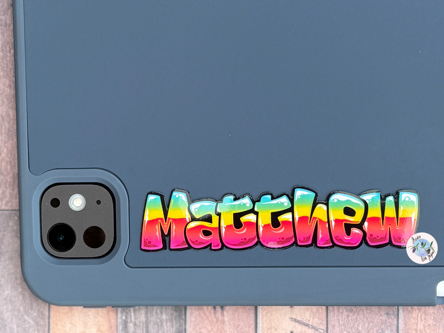 Tablet case with 'Matthew' in colourful tropical graffiti name sticker