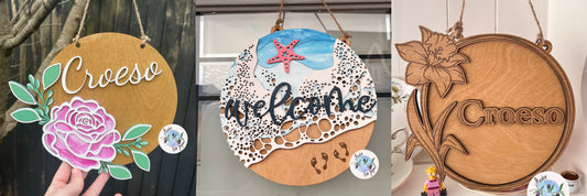 Handmade and hand painted welcome signs in Welsh and English