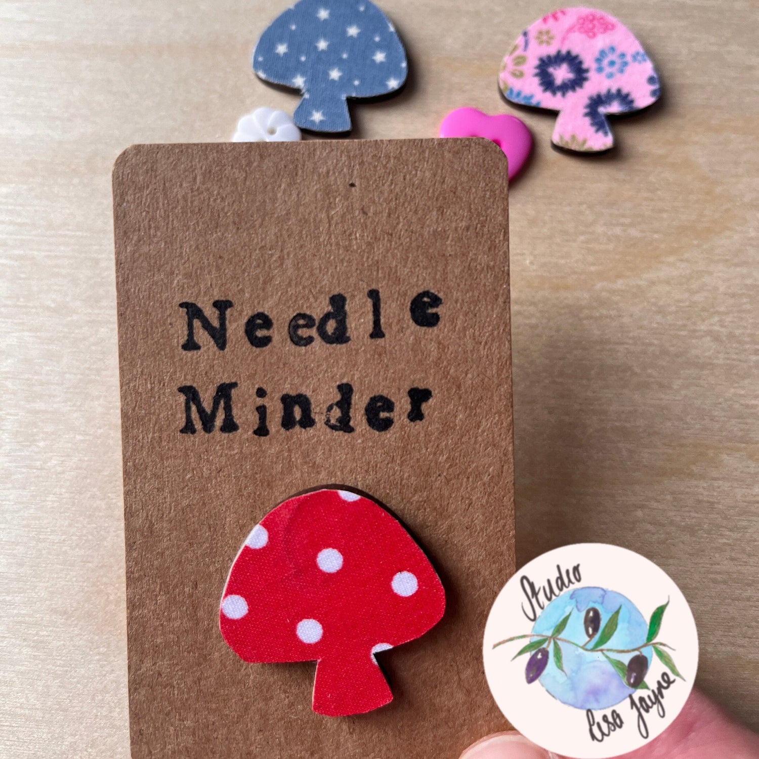 Mushroom shaped needle minder for sewers and crafters