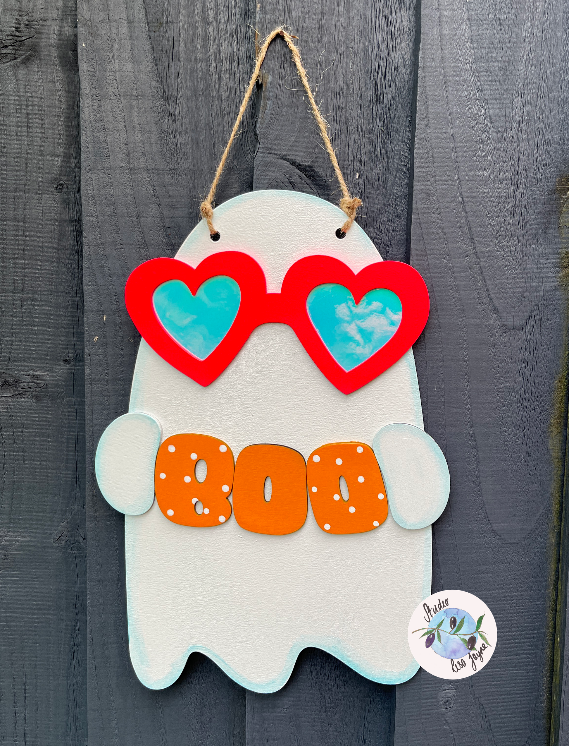 Fun friendly ghost Halloween sign - wearing reflective glasses and holding a boo sign - garden fence