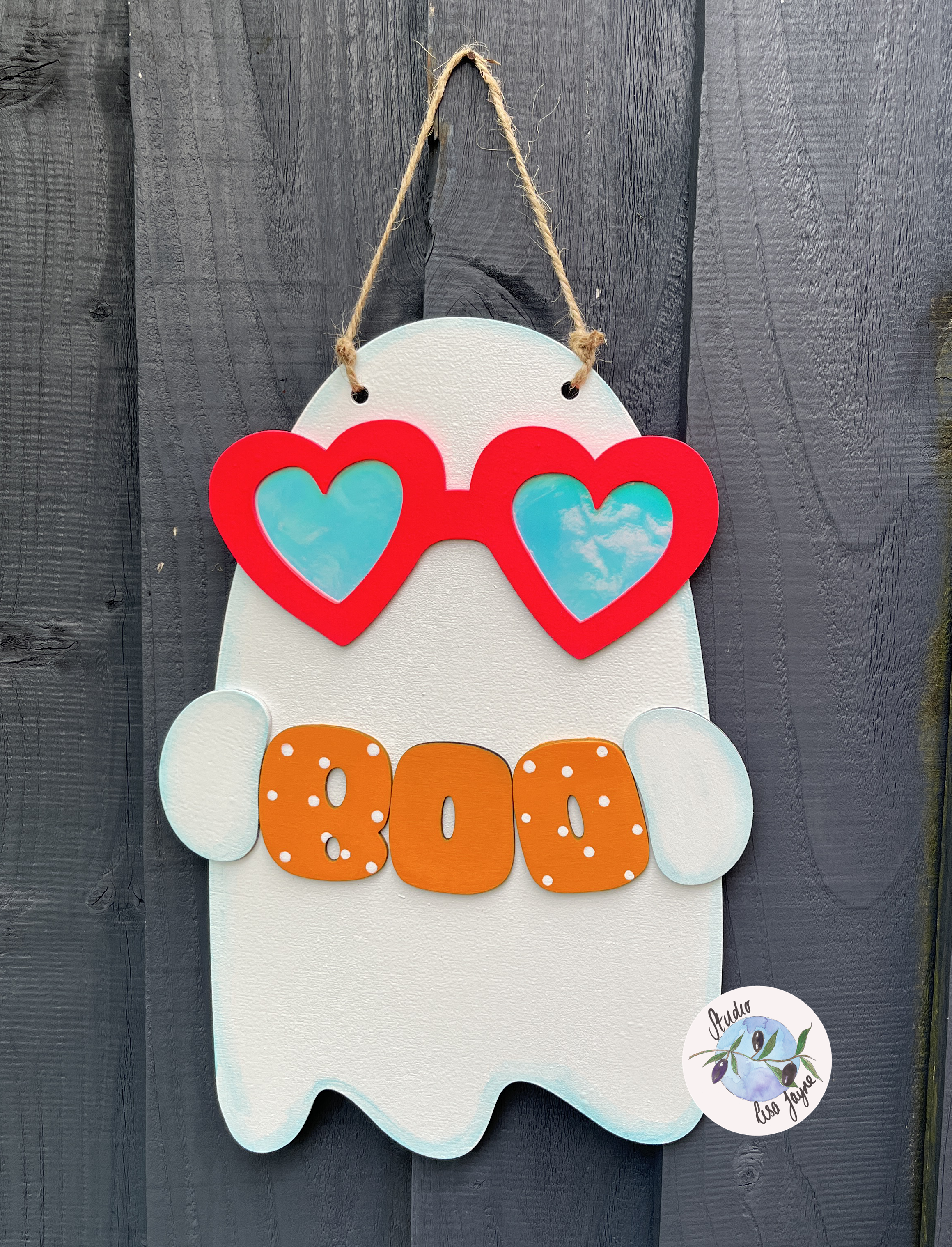 Fun friendly ghost Halloween sign - wearing reflective glasses and holding a boo sign - garden fence