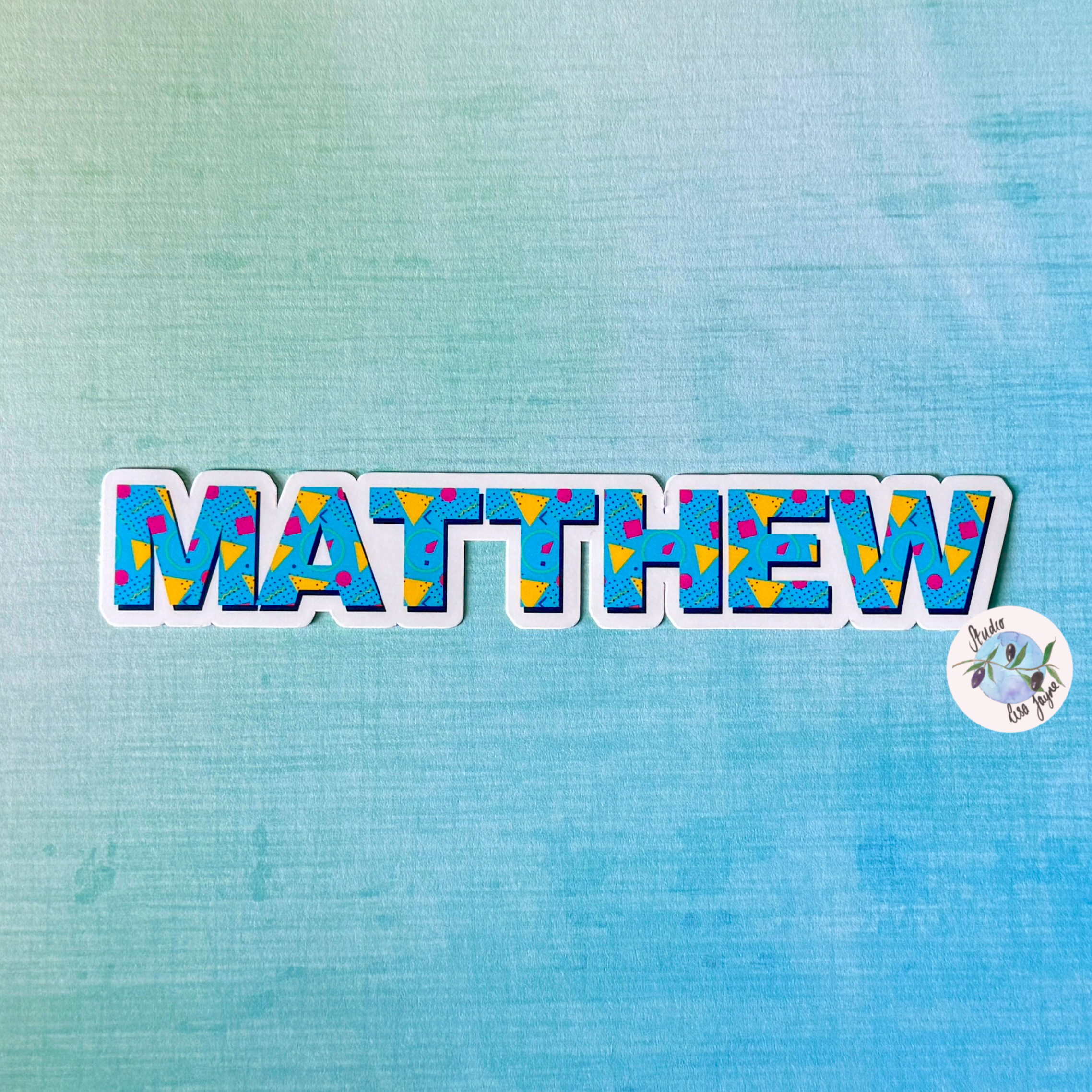 80s Style Personalised Waterproof Vinyl Name Sticker Patterned Geometric Retro Closeup on Matthew name label