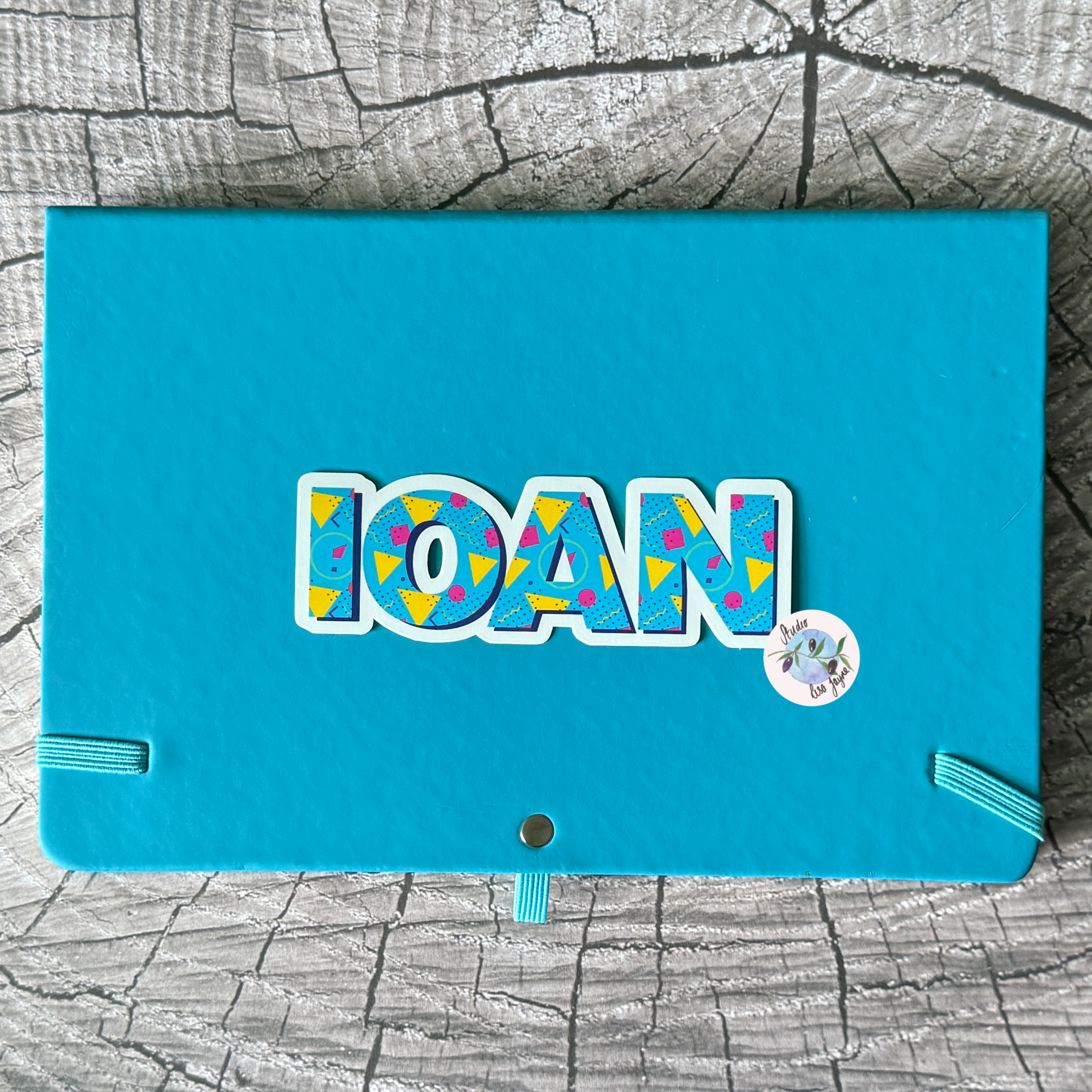 80s Style Personalised Waterproof Vinyl Name Sticker Patterned Geometric Retro - Applied to notebook, diary, journal