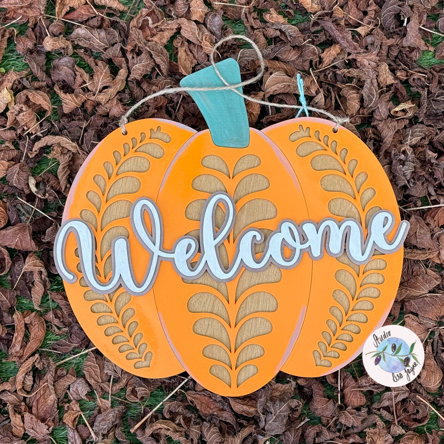 Hand painted Welcome Pumpkin Autumn large sign 30cm x 30cm - laying on a pile of autumn leaves