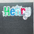 Black notebook with a col/orful Aeroplane Airplane 'Henry' sticker