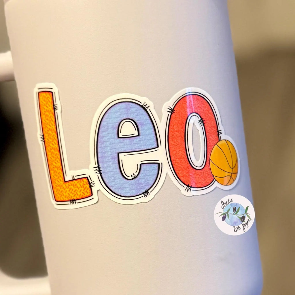 Colourful 'Leo' sticker with a basketball graphic on a white water drink bottle