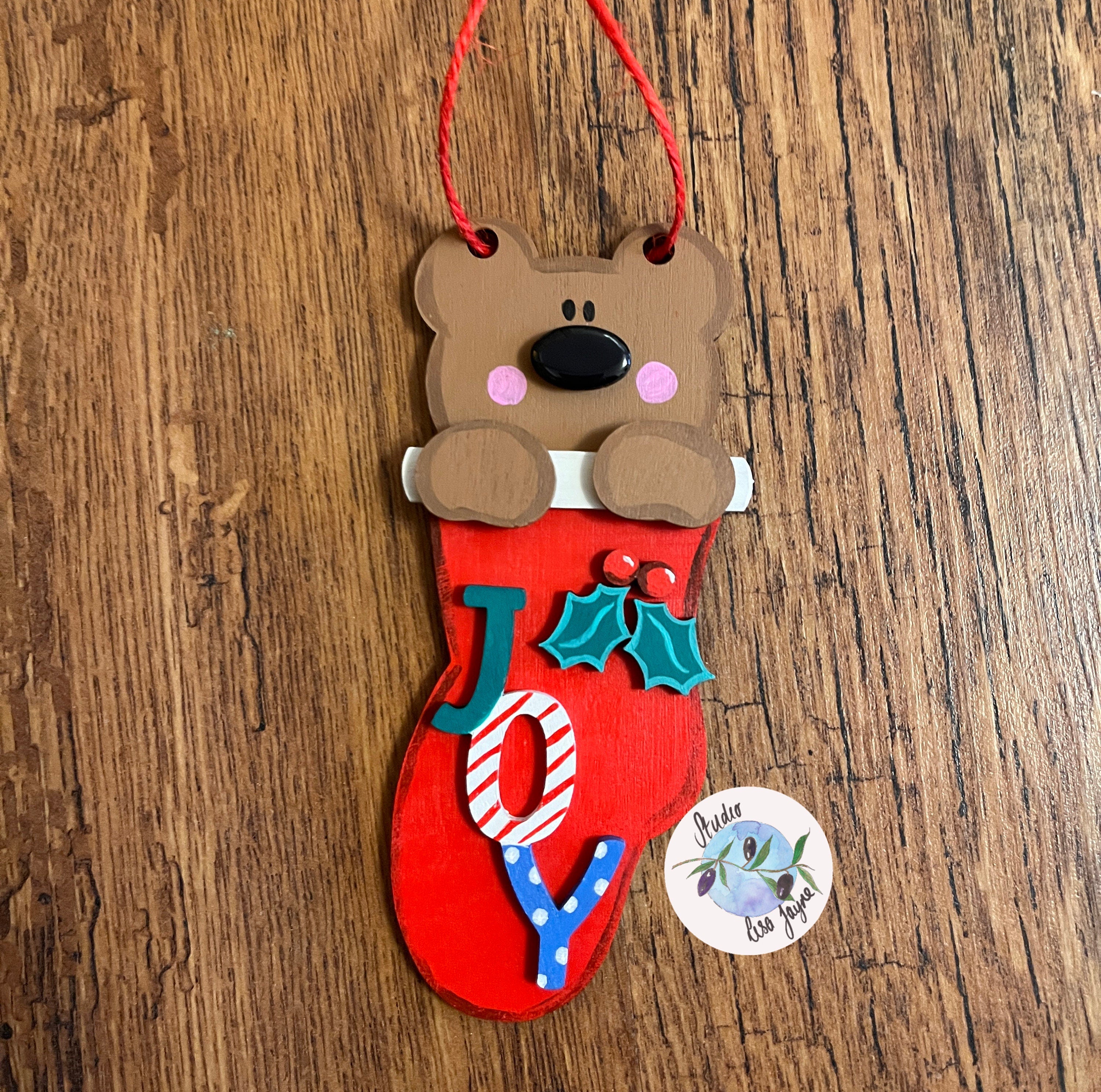 Bear in Stocking Christmas Tree Decoration Wooden Backdrop