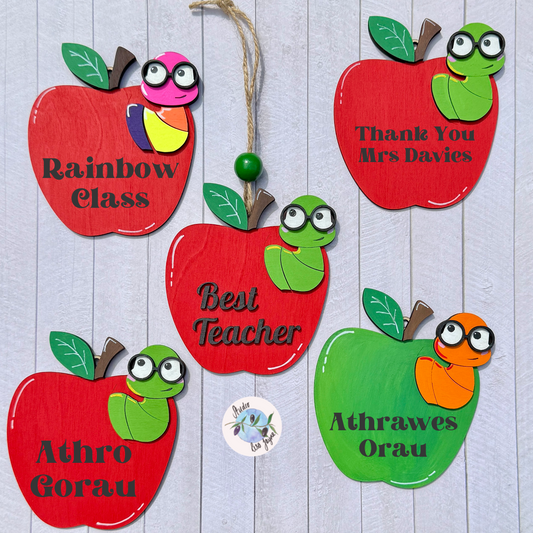 Best Teacher Apple End of Term Handmade Hanging Gift.  Layered plywood hand painted in red and green Thank You Teacher apple design

Welsh options available Athro Gorau, Athrawes Orau, Welsh Diolch 