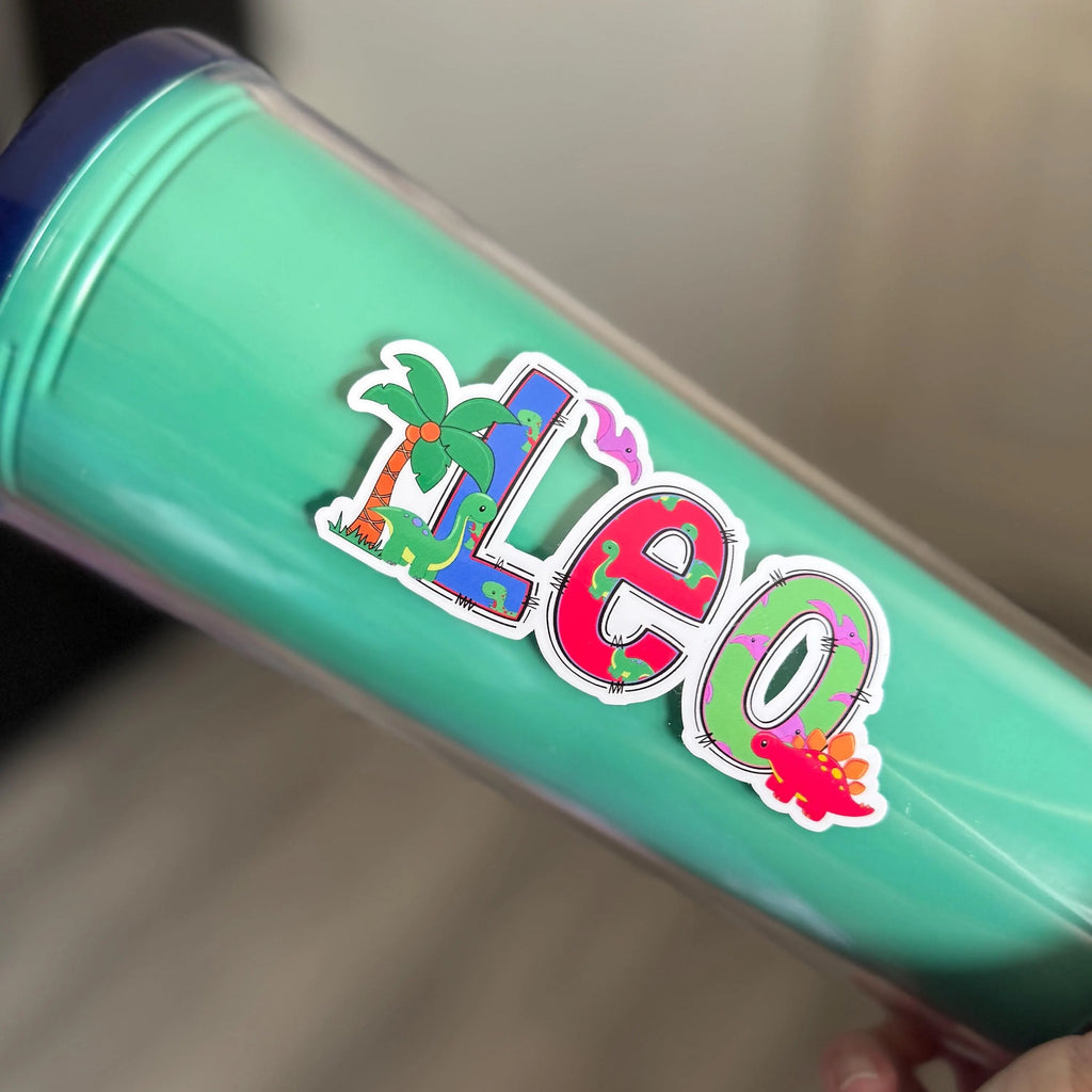 Colorful name 'Leo' with cartoon character dinos on a green water drink bottle
