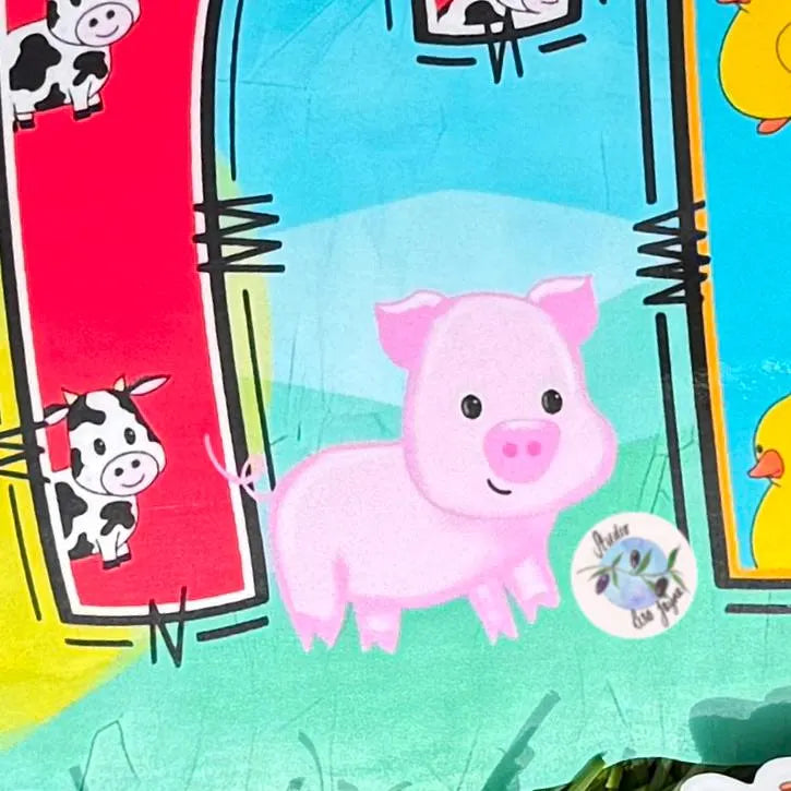 Closeup of a colorful sticker decal with cartoon pig and cow designs