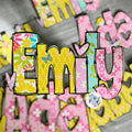 Colourful flower name 'Emily' sticker with floral and heart designs.  ideal for drink bottles, laptops and suitcases