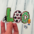 Football Name Sticker personalised, sport Name Label customised for drinks bottle, iPad, tablet, laptop.  Closeup in hand