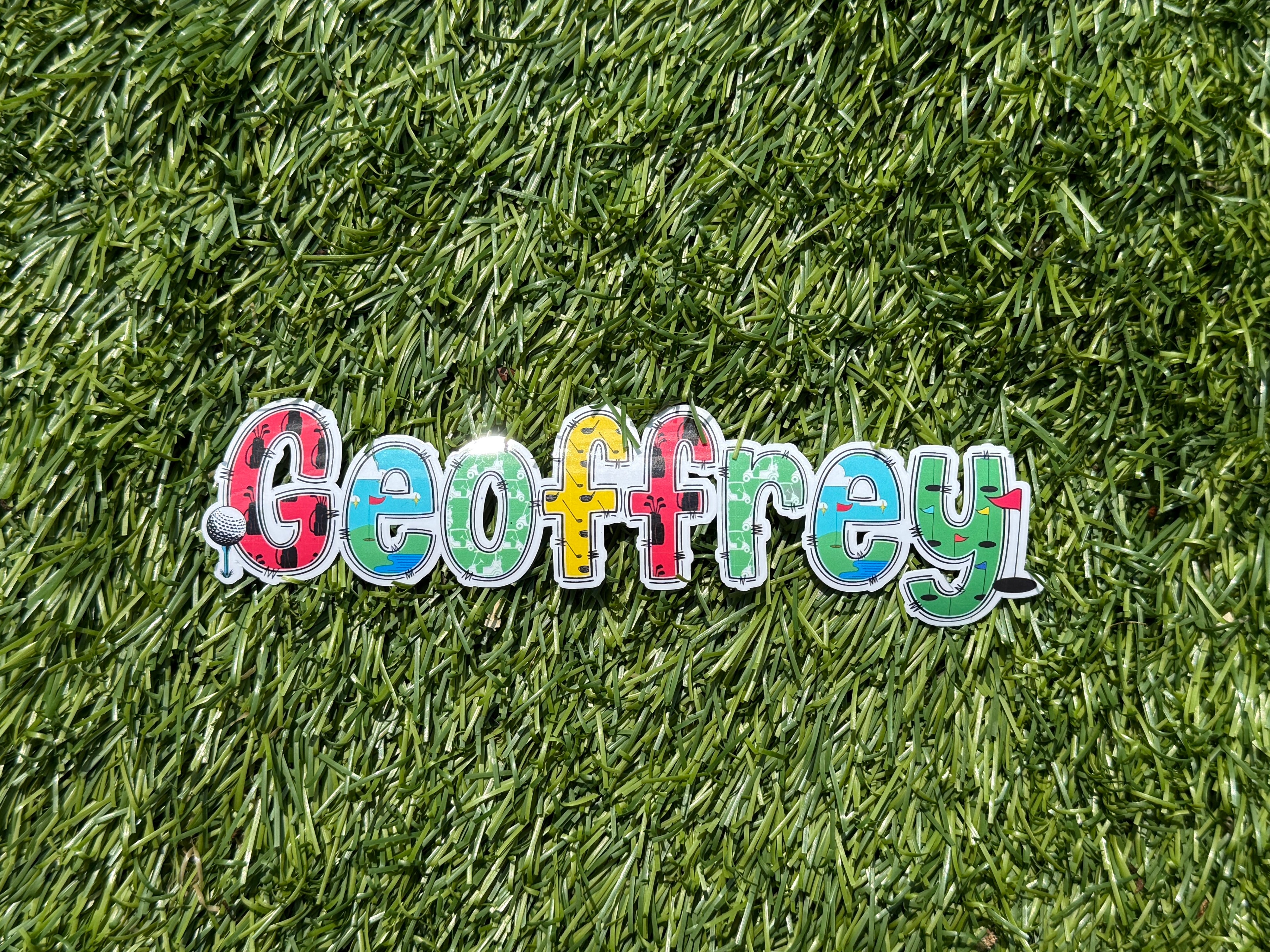 Golf Personalised Name Sticker.  Ideal to apply to drink water bottles, notebooks, laptops and tablets.  Geoffrey laid on golf green