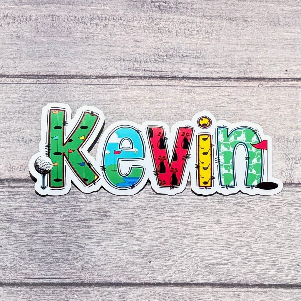 Golf Personalised Name Sticker.  Ideal to apply to drink water bottles, notebooks, laptops and tablets.  Kevin on simple wooden backdrop