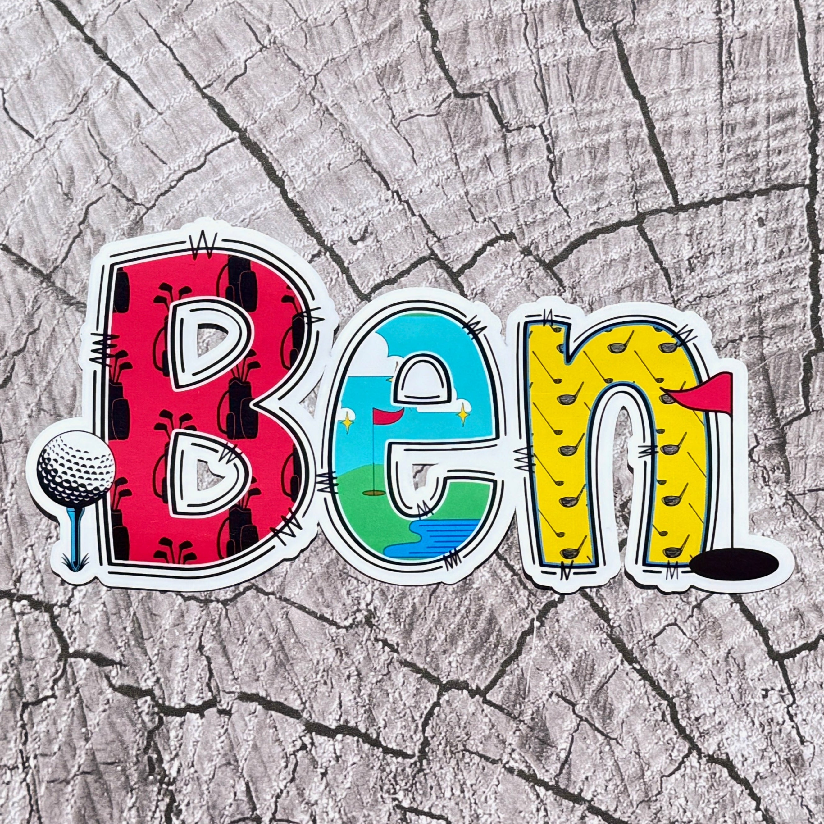 Golf Personalised Name Sticker.  Ideal to apply to drink water bottles, notebooks, laptops and tablets.  Ben name decal laid upon wooden background