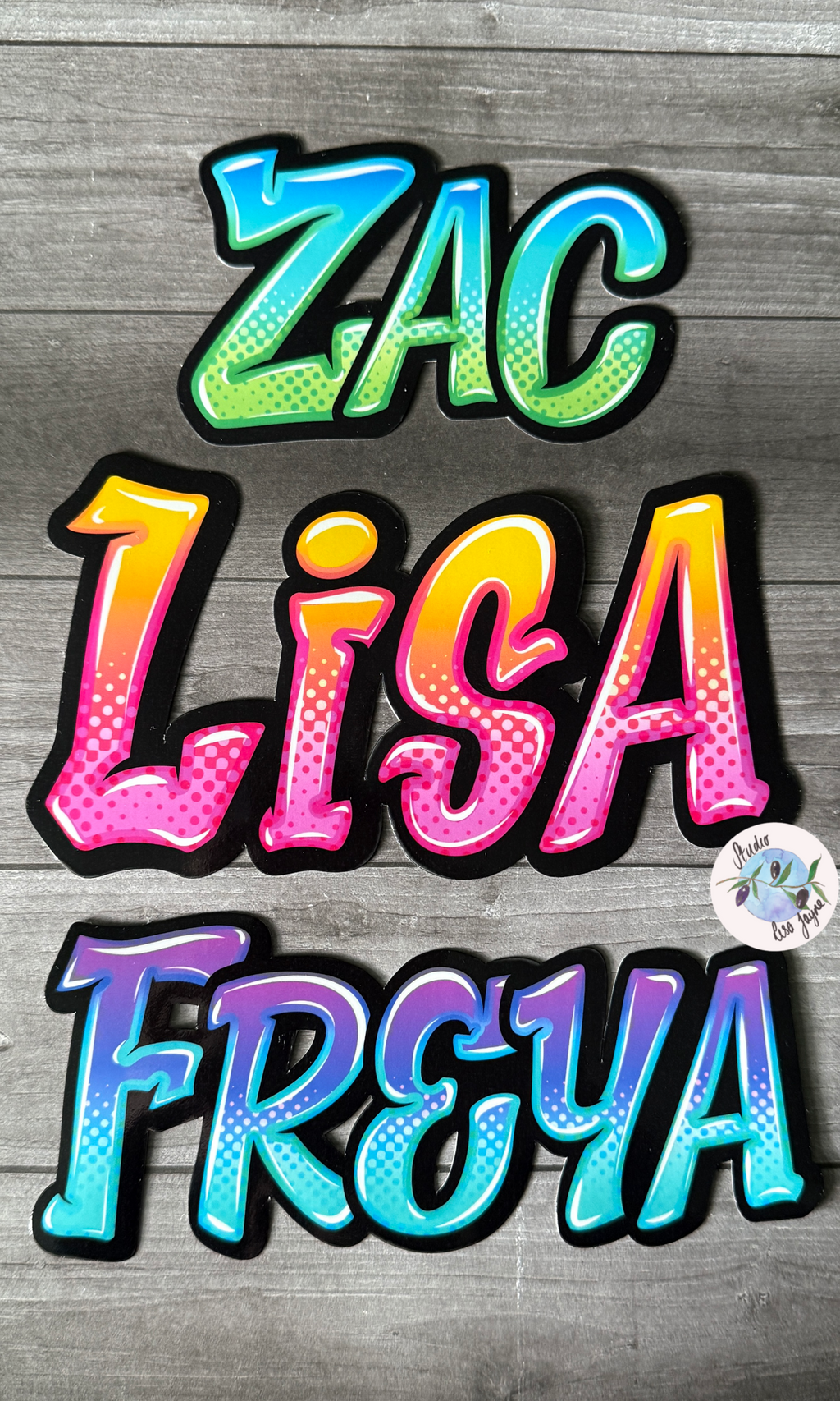 Graffiti Name Personalised Sticker Orange Pink Purple Green Blue - Zac, Lisa and Freya.  Gradient stippling and comic style.  Laid out on a wooden backdrop in an social story format