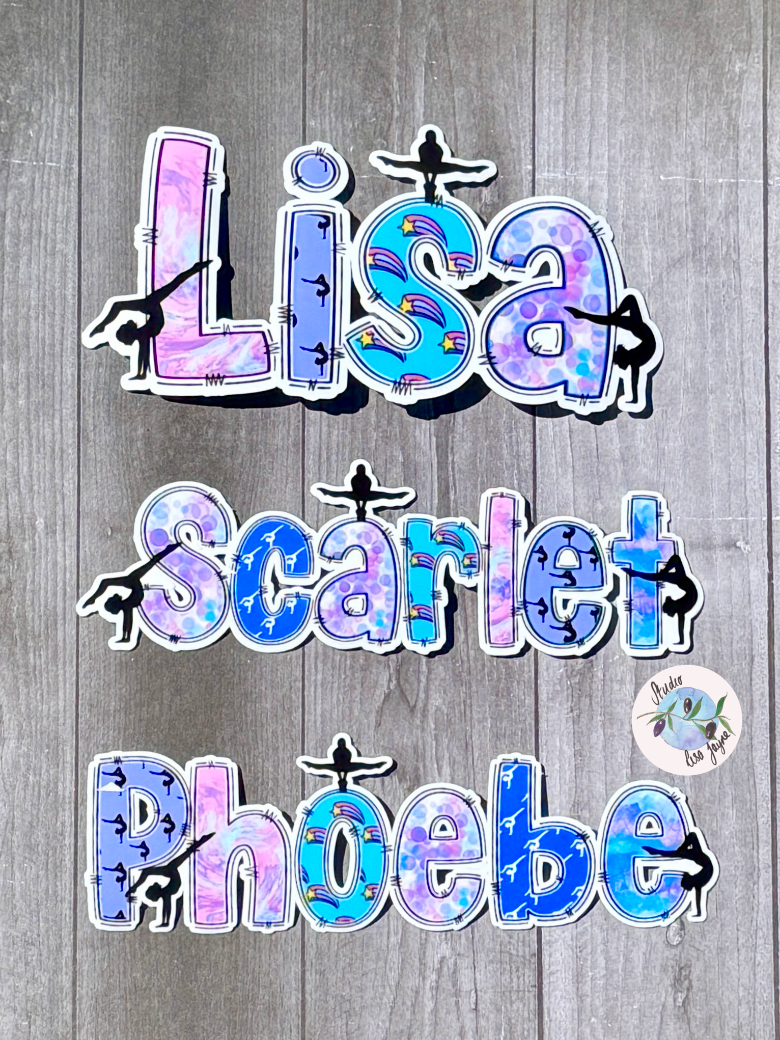 Gymnastics Name Sticker Applied to a notebook.  Waterproof personalised sports label for diary, journal, water bottle, tablet, phone