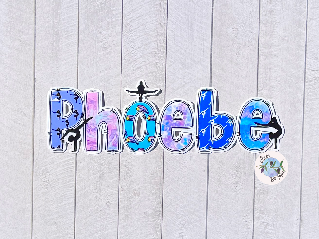 Gymnastics Name Sticker Applied to a notebook.  Waterproof personalised sports label on simple plain backdrop