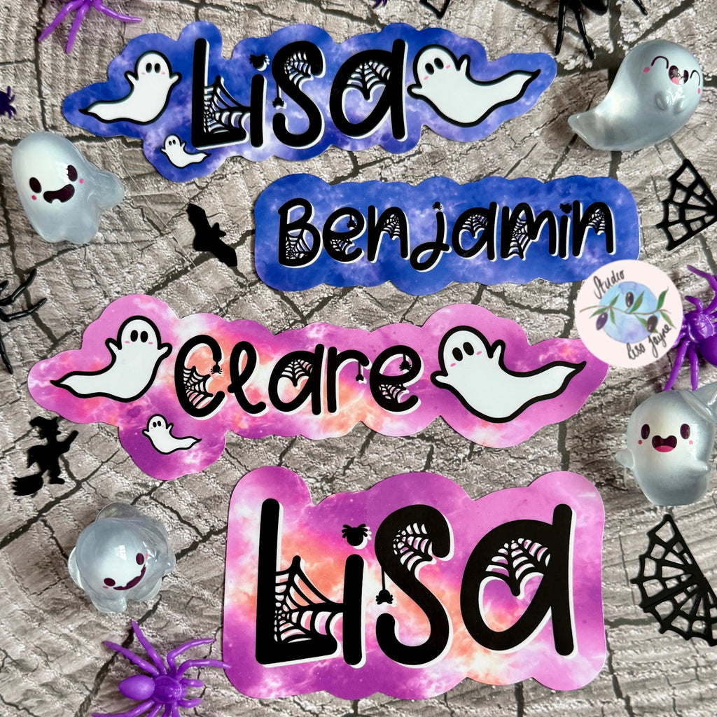 Colorful ghost halloween name stickers with ghost designs on a textured background 