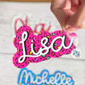 Colorful name tag with 'Lisa' on a white background