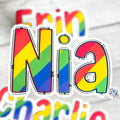 Colourful rainbow name 'Nia' sticker with rainbow design on a blurred background