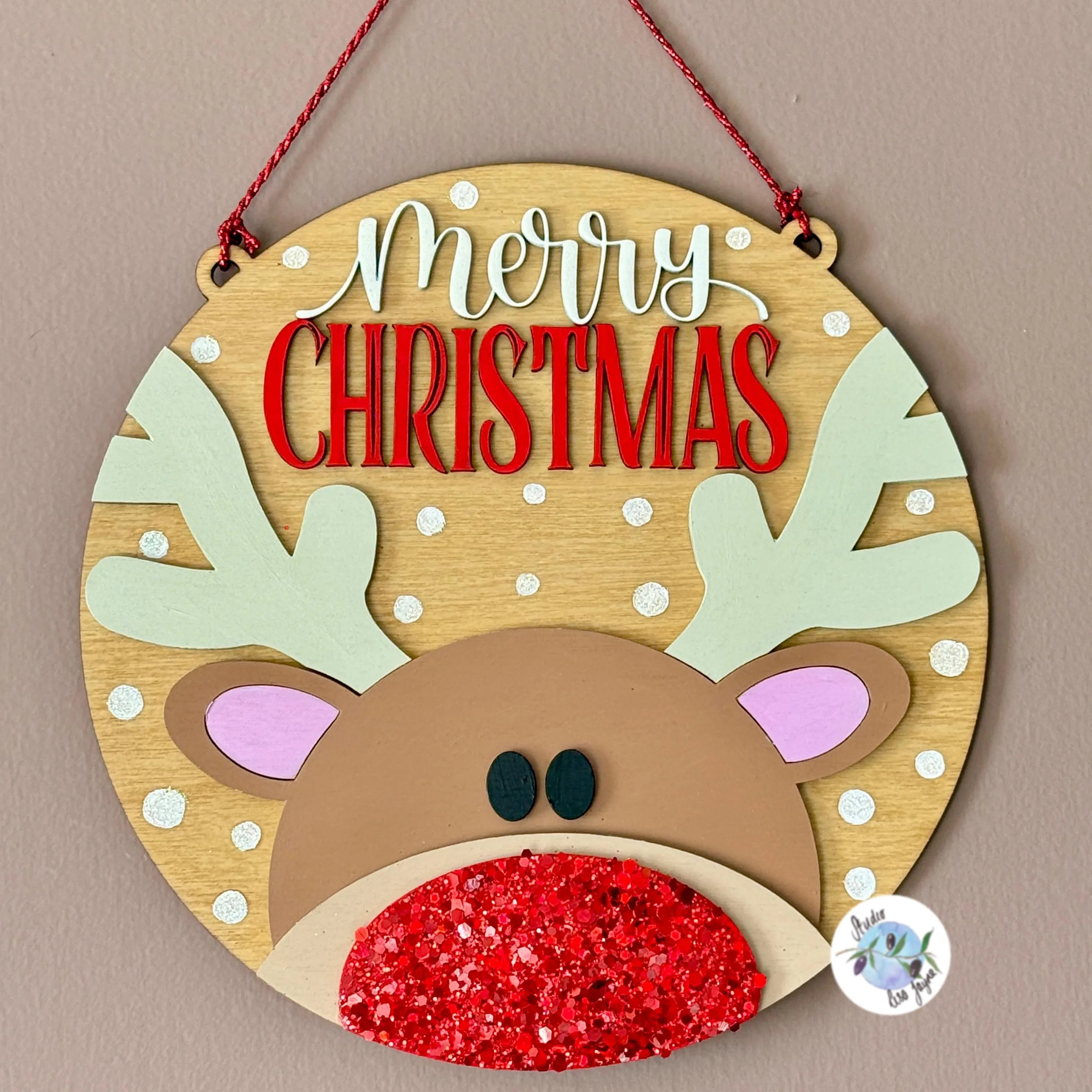 Wooden Christmas ornament with reindeer design and 'Merry Christmas' with glitter red nose