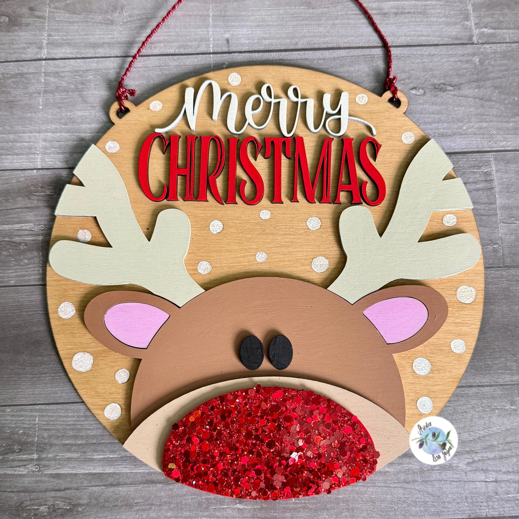 Wooden reindeer head decoration with 'Merry Christmas' text with a glittery nose