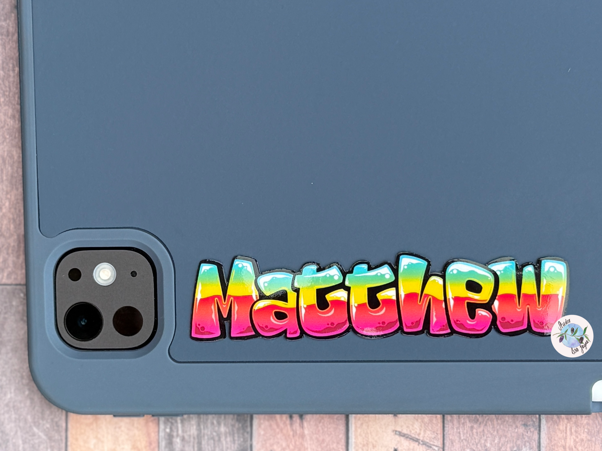 Tablet case with 'Matthew' in colourful tropical graffiti name sticker