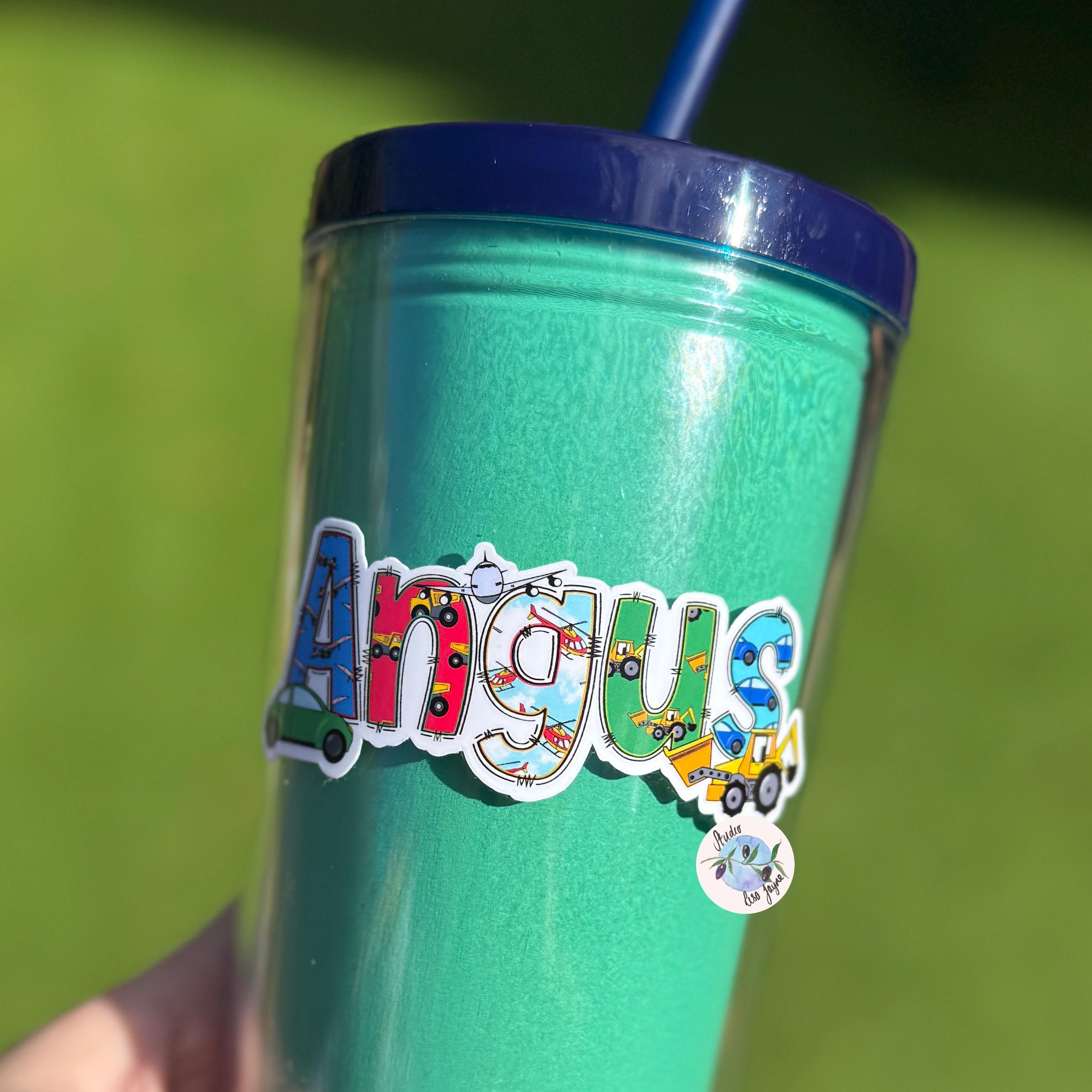 Green tumbler with colorful 'Angus' Vhice design on a green background.  Cars, diggers, aeroplane