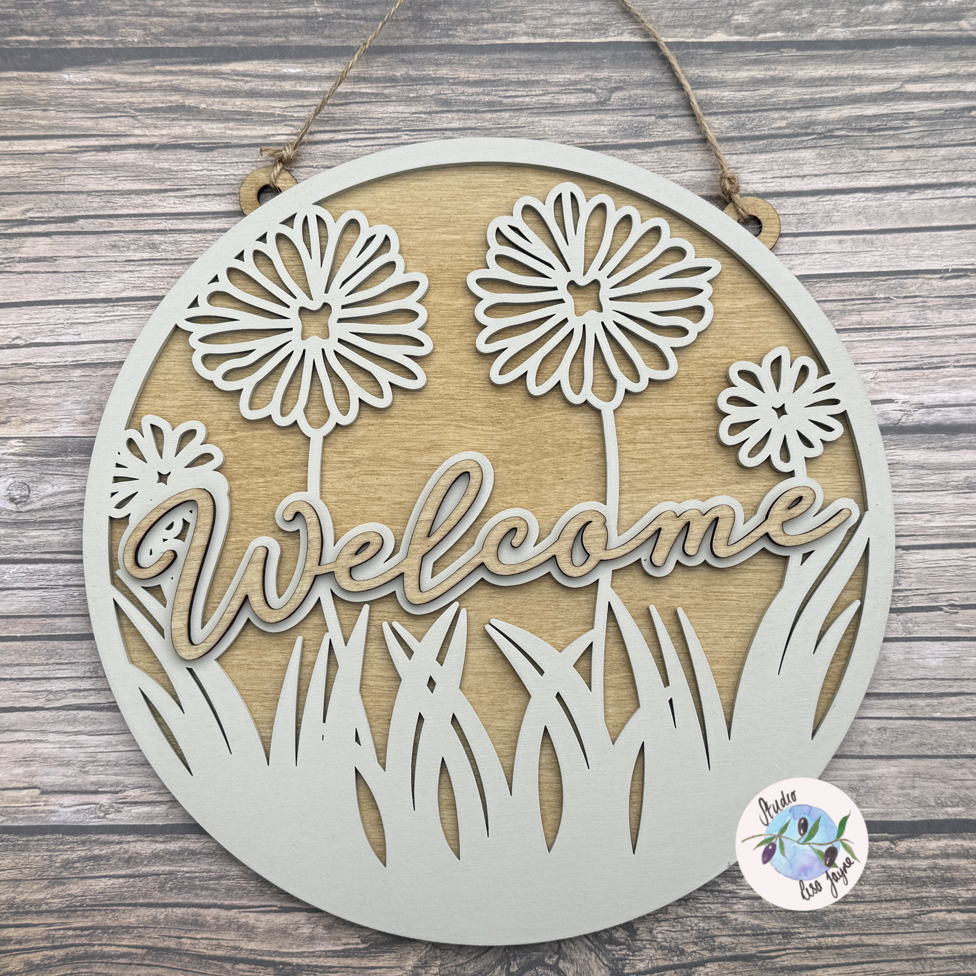 Welcome Flower Hand Painted Handmade Hanging Wooden Sign on a simple wooden background