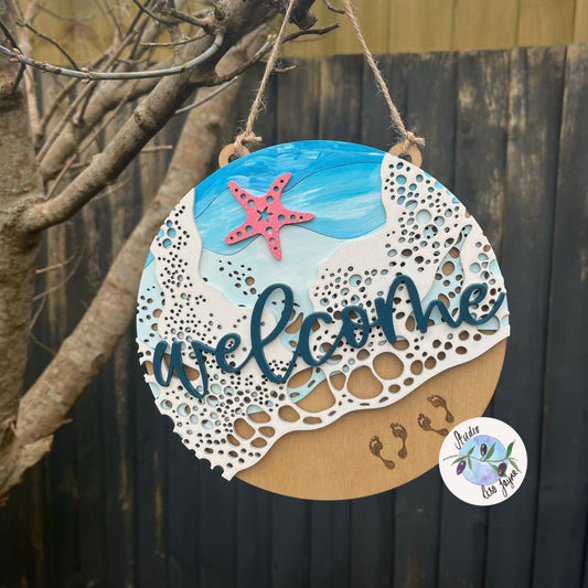 Welcome Layered Beach Sea Ocean Hanging Wooden Sign Hanging from a Tree