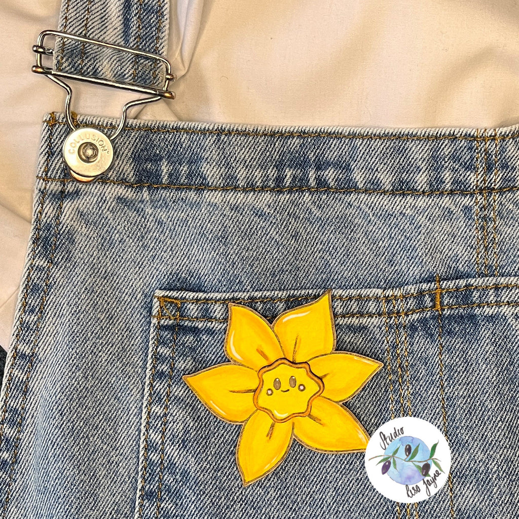Welsh Daffodil Handpainted Wooden Brooch on denim dungarees 