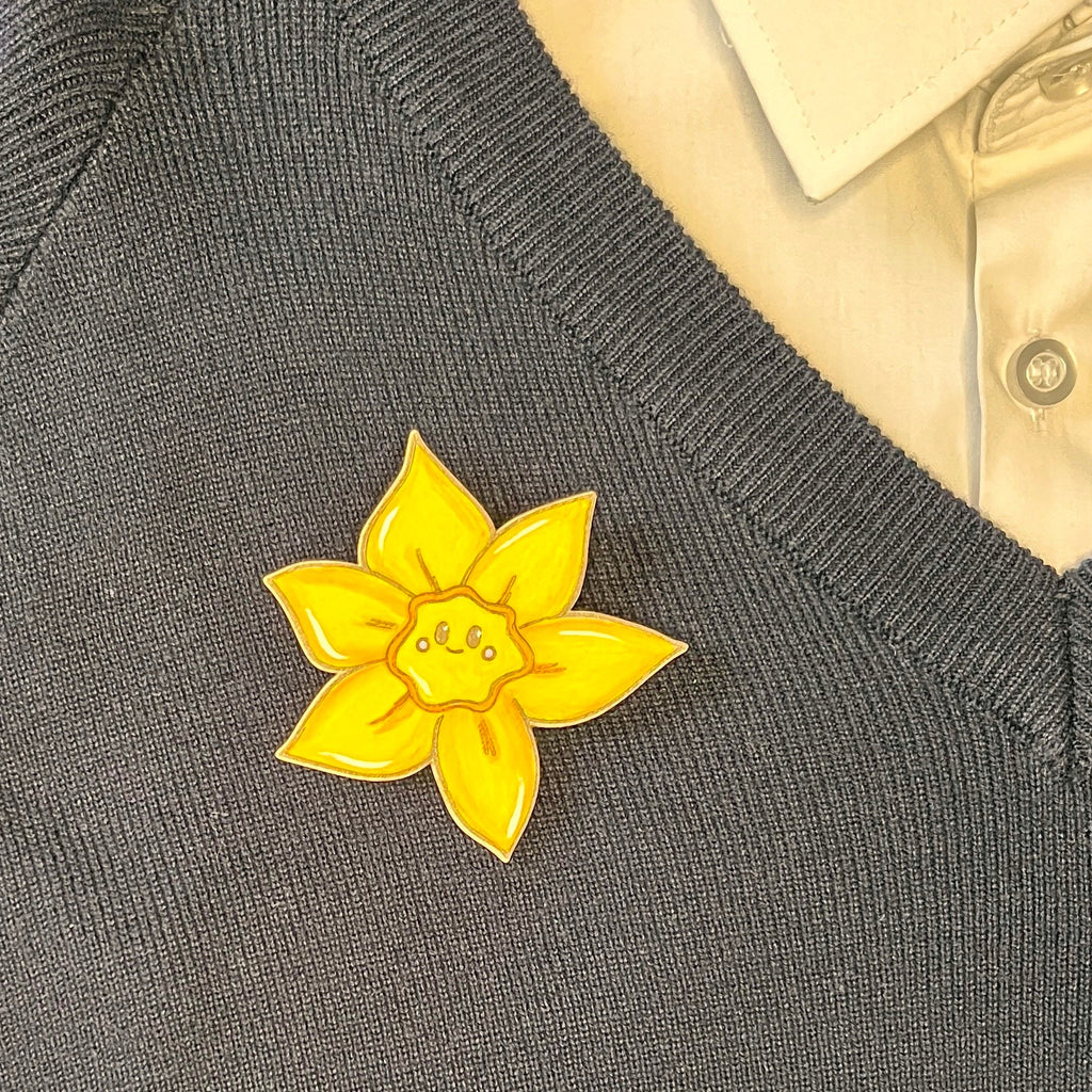 Welsh Daffodil Handpainted Wooden Brooch on a school jumper ideal for St David's Day
