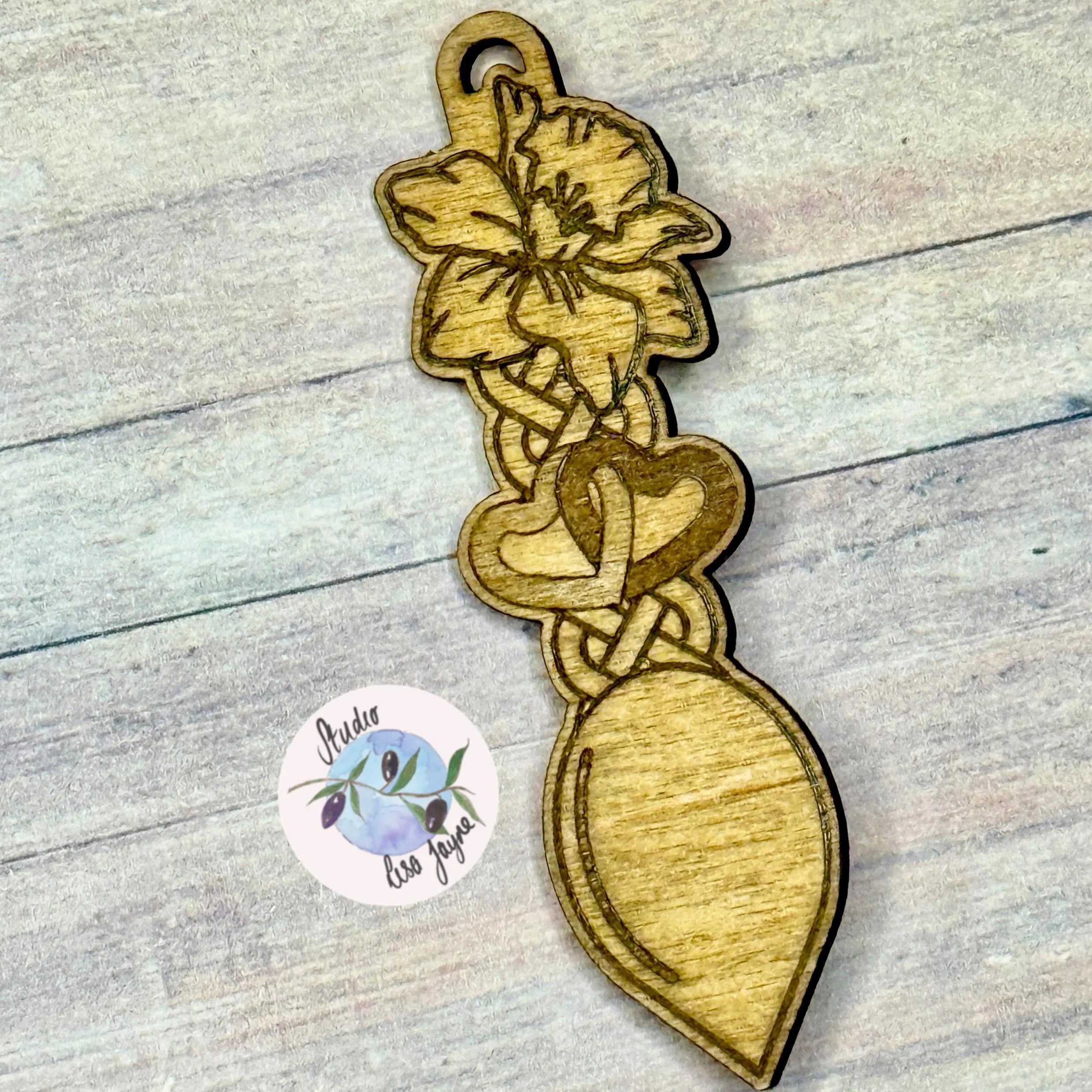 Wooden love spoon welsh brooch with floral design.  Ideal for St David's Day