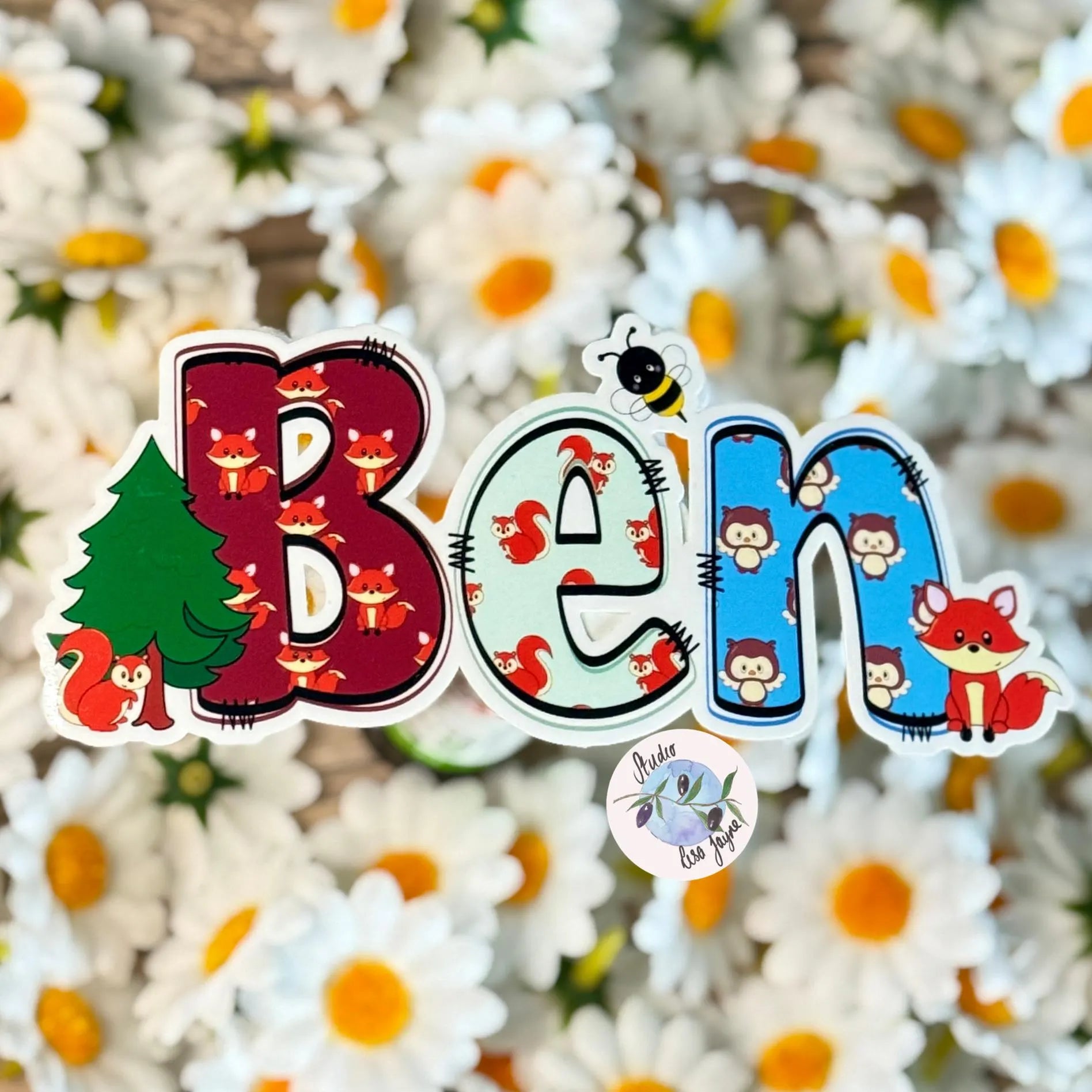 Colourful woodland animal 'Ben' name sticker with cartoon characters on a floral background.  fox, bee, squirrel 