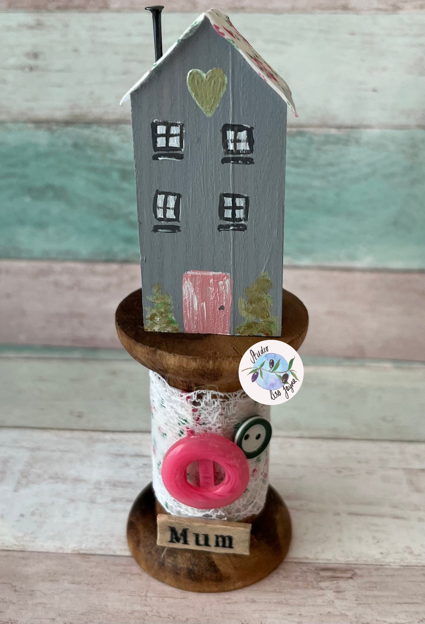 Rustic House on Vintage Style Wooden Spool Mum