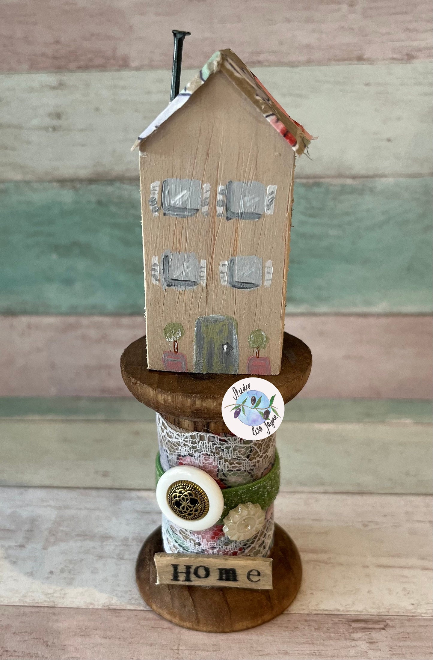 Rustic House on Vintage Style Wooden Spool