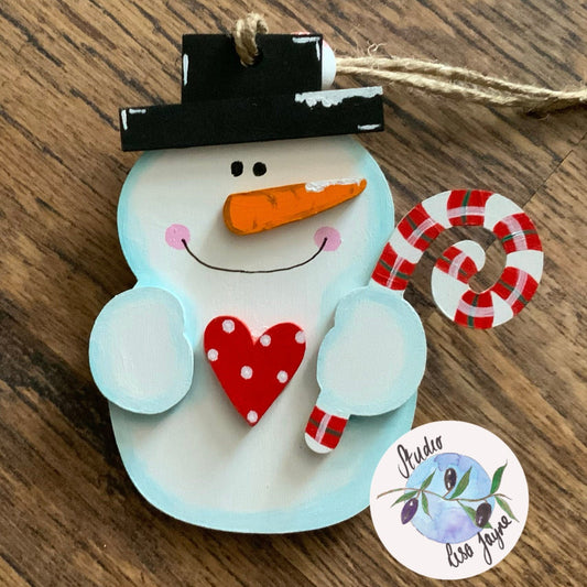 3D Hand Painted Snowman Christmas decoration holding a sugarcane with a polka dot red heart - Zoomed