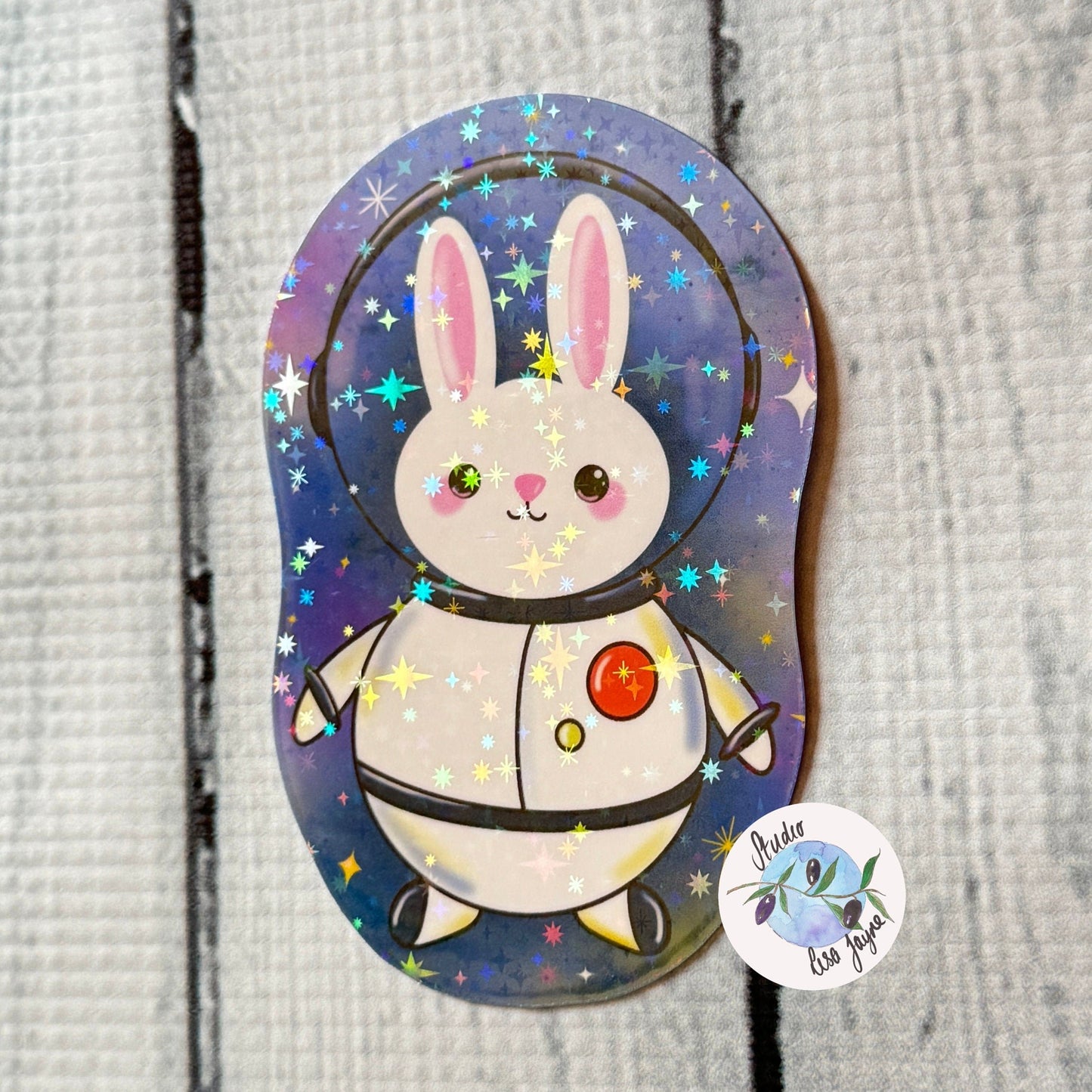 Kawaii Space Bunny Waterproof Sticker with Holographic Star Vinyl covering - Close up