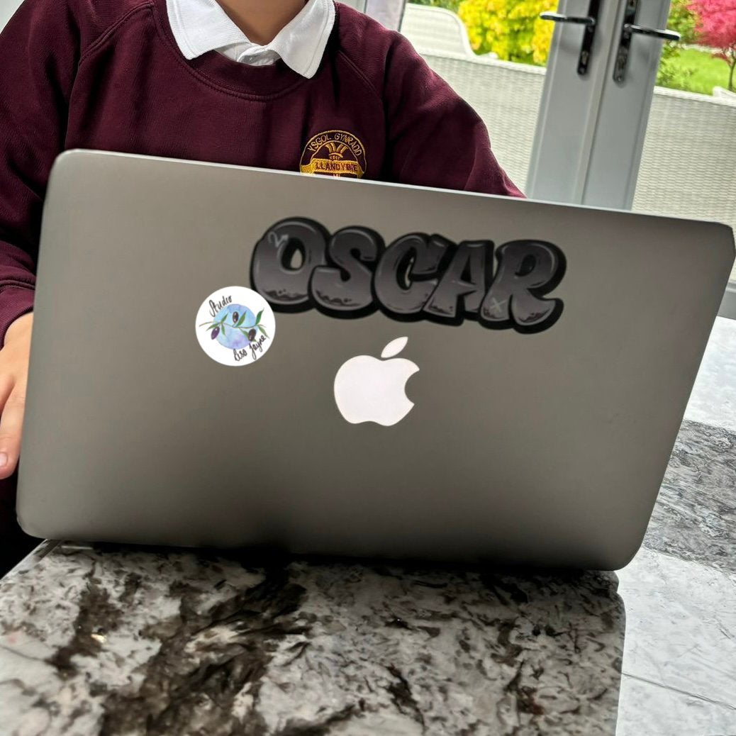 Cool graffiti Monochrome laptop name sticker on a MacBook Air