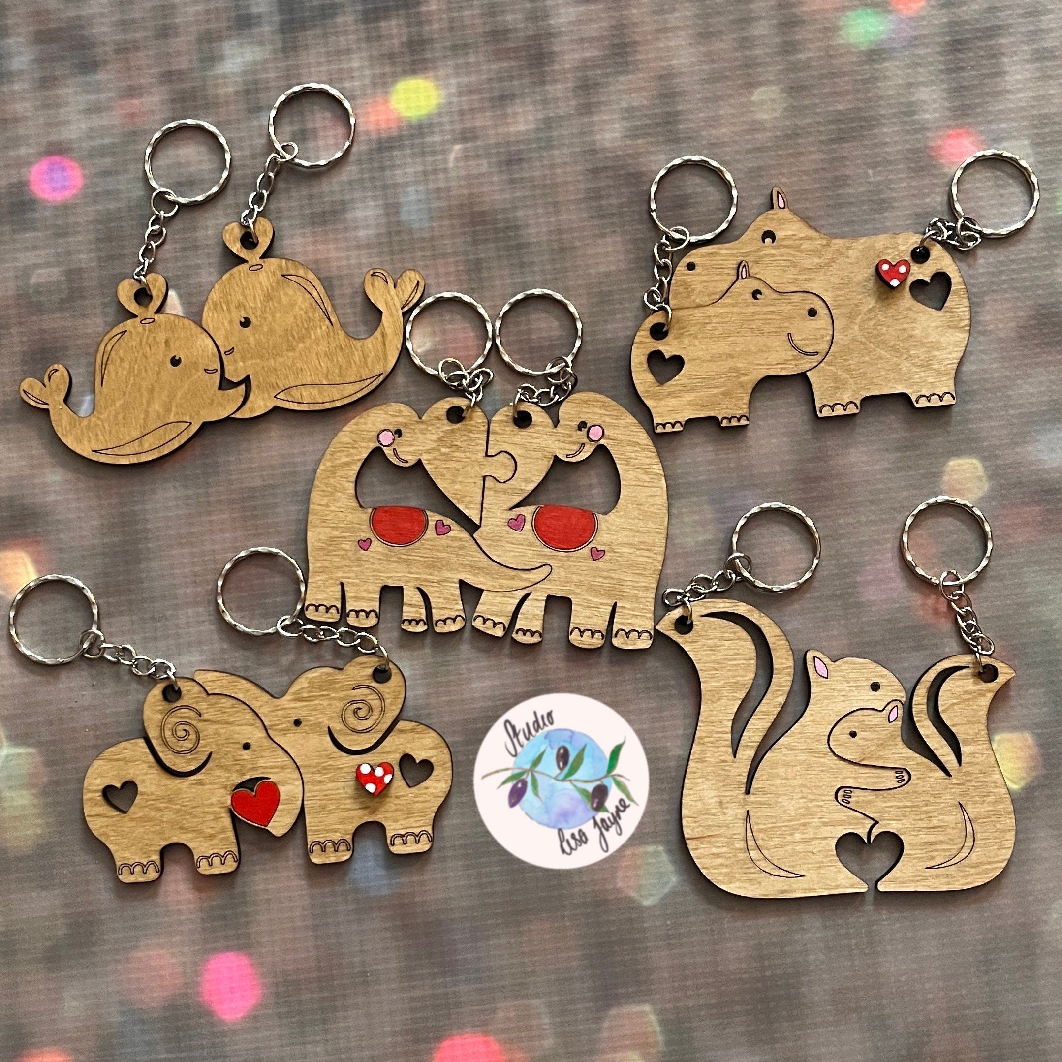 Collection of love anniversary animal pair keyrings jigsaw valentines day - whales, hippos, dinos, dinosaurs, elephants, squirrels 