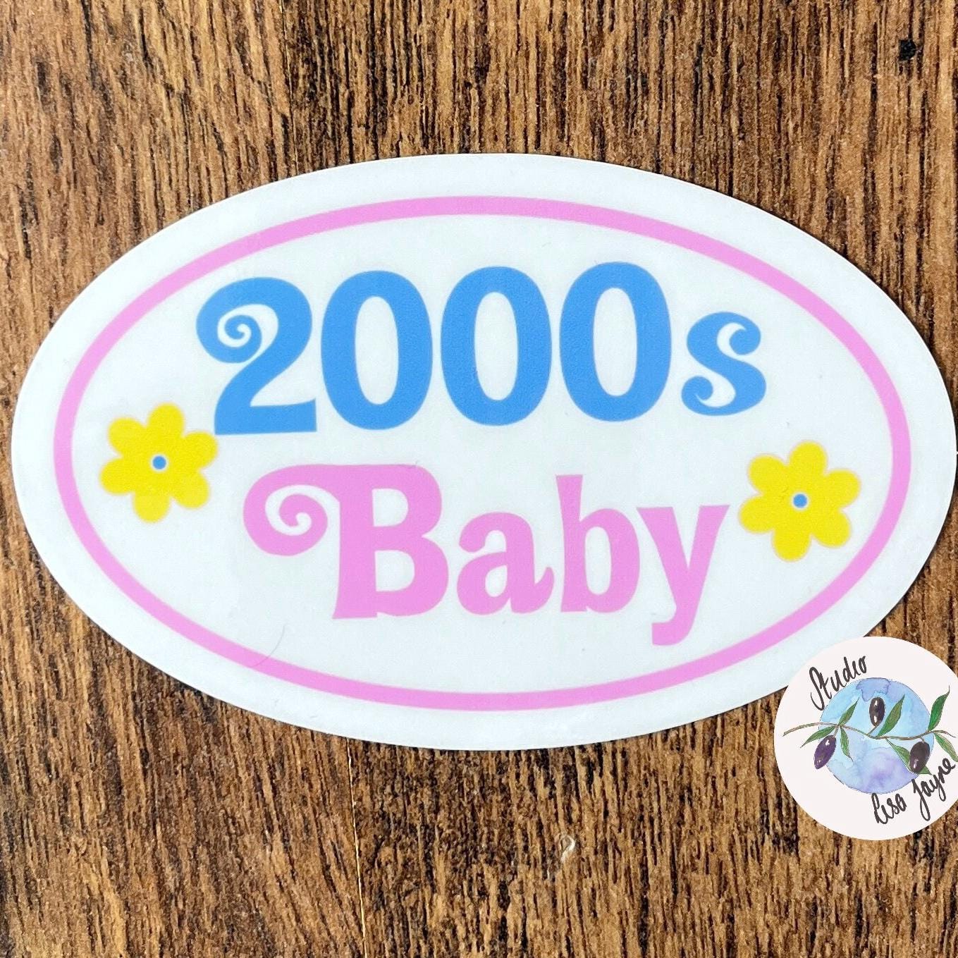 Waterproof Vinyl Sticker to celebrate people born in the 2000.  Floral 2000 Baby Sticker - Close up