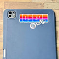Bright Ombré multicoloured Personalised Name Waterproof Vinyl Sticker For Smooth Surfaces - a blue tablet case with a rainbow sticker on it