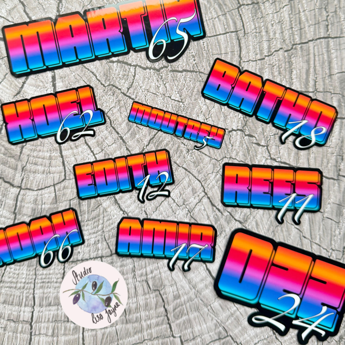 Bright Ombré multicoloured Personalised Name Waterproof Vinyl Sticker For Smooth Surfaces - a group of colorful stickers on a tree stump