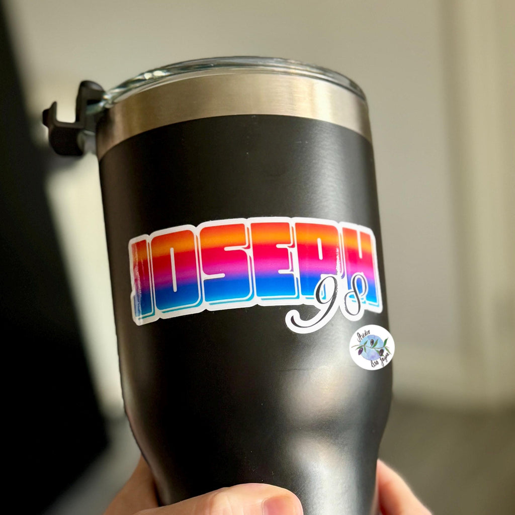 Bright Ombré multicoloured Personalised Name Waterproof Vinyl Sticker For Smooth Surfaces - a person holding a black and silver cup