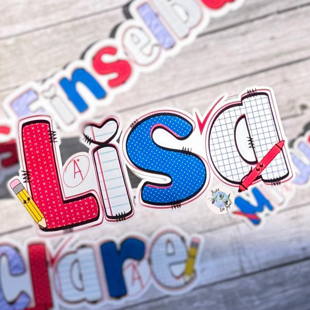 Teacher Name Sticker Label - a group of stickers on a wood surface
