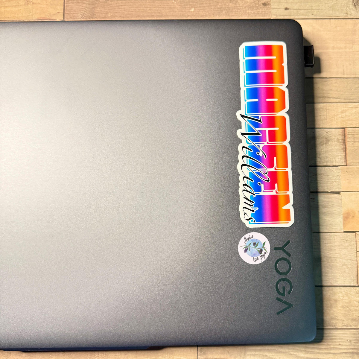 Bright Ombré multicoloured Personalised Name Waterproof Vinyl Sticker For Smooth Surfaces - a laptop on a wood surface